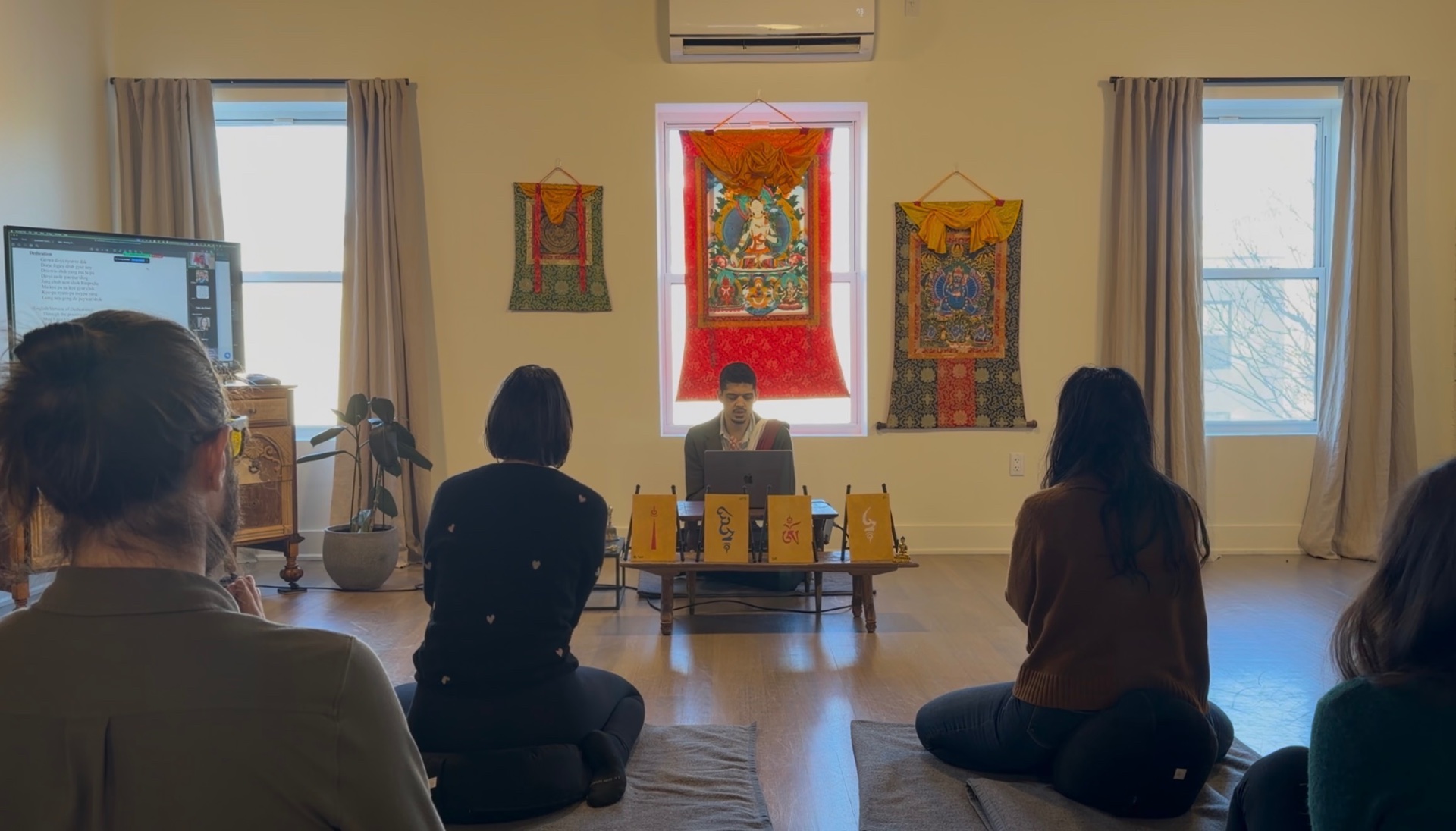 Sangha in practice before the White Tara thangka